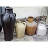 Stoneware flagon, a large decorative garden terracotta pot painted black, 77cm high and two other