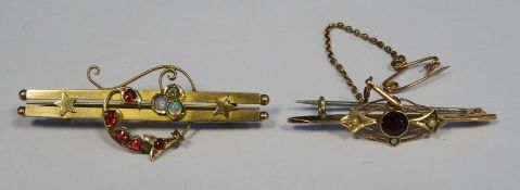 Gold bar brooch set with opals and rubies with star decoration (one opal missing), gold marks