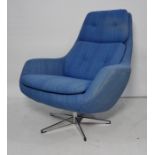 1960's designer swivel armchair in the manner of Robin Day in blue upholstery, chrome effect base