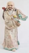 20th century Chinese porcelain figure of a man, impressed six-character mark to base, modelled