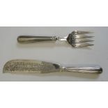 Pair of Victorian silver fish servers, pierced decoration and decorated with fish among reeds,