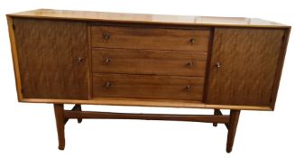 Gordon Russell Afromosia teak sideboard, three central drawers, flanked by cupboard doorsCondition