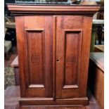 20th century two door cabinet with moulded cornice, panelled doors emblazoned H De Cabanas Y