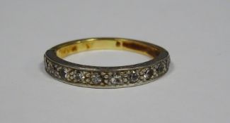 Gold and diamond half-eternity ring set with 12 small diamonds (gold marks worn), 3.5g total