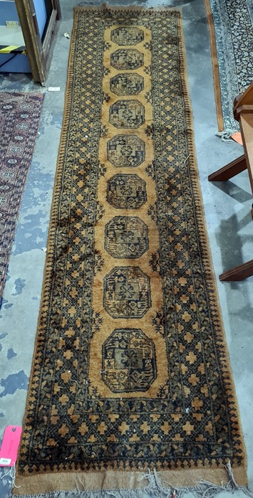 Mustard ground runner with nine elephant foot guls, in yellows and blacks, 75cm x 250cm approx