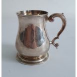 George II silver mug of baluster form, London, maker's marks worn, dated 1750, 7.9oz or 224g