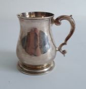 George II silver mug of baluster form, London, maker's marks worn, dated 1750, 7.9oz or 224g