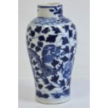 Chinese porcelain blue and white small baluster vase painted with dragons amongst scrolling