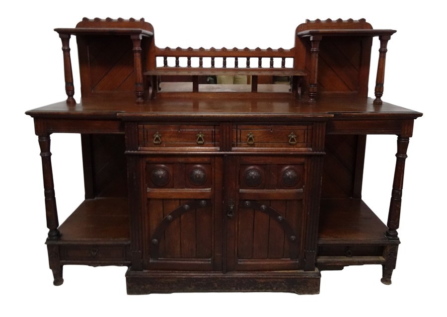 Oak aesthetic period sideboard with mirrored back, two central drawers and cupboard doors above