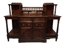 Oak aesthetic period sideboard with mirrored back, two central drawers and cupboard doors above