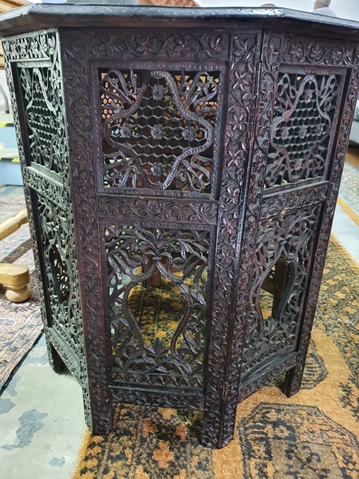 Anglo-Indian octagonal centre table with relief carved top with allover foliate decoration on - Image 6 of 16