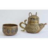 Asian brass teapot, cover and bowl, probably Tibetan, late 19th/early 20th century, the teapot