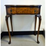 20th century walnut single drawer side table with serpentine front, raised on cabriole legs, 59cm
