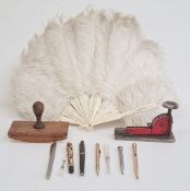 Bone and white ostrich feather fan, a blotter, a stapler, a Waterman Ideal fountain pen, 2 Mont