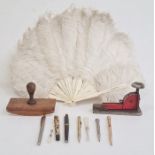 Bone and white ostrich feather fan, a blotter, a stapler, a Waterman Ideal fountain pen, 2 Mont
