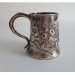 WITHDRAWN -18th century silver mug with later repousse decoration, scroll and floral, all marks