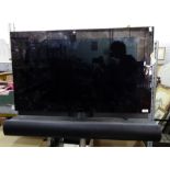 Bang & Olufsen Beovision 7 40" flatscreen television set  (type 9184) on stand with a speaker, a