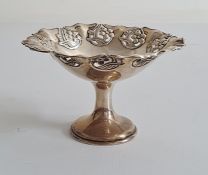 Early 20th century small circular pedestal dish, floral relief decoration to rim, Chester 1908, with
