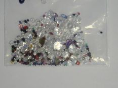 Bag of loose mixed stones including cubic zirconia, ruby, sapphire, emerald, amethyst and other