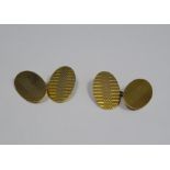 Pair of 9ct gold cufflinks, oval-shaped engine-turned decoration, boxed, 4g approx