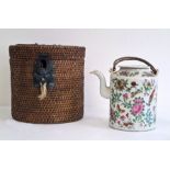 Chinese famille rose Canton teapot and cover in travelling fitted wicker case, circa 1890-1910,