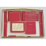 Red leather stationery set to include address book, photograph frame, notepad, organiser, letter