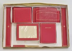 Red leather stationery set to include address book, photograph frame, notepad, organiser, letter