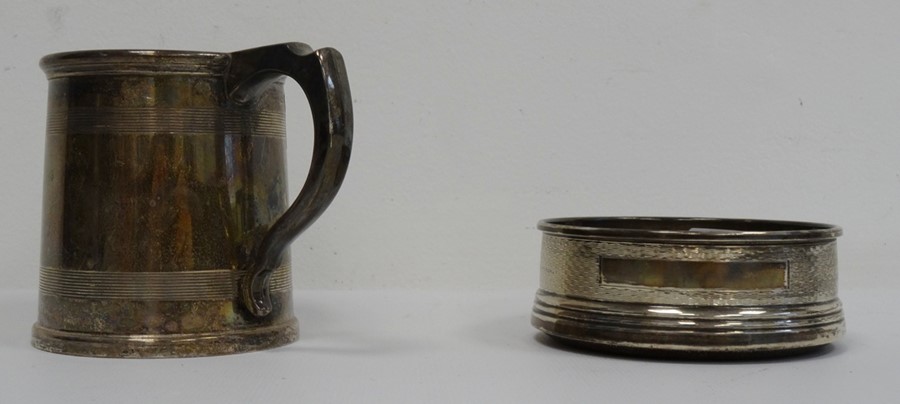 1920's silver tankard with reeded decoration and initials 'RIJ', Birmingham 1923, maker's mark worn,