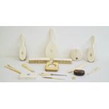 Early 20th century ivory-mounted dressing table set to include brushes, glove stretchers,
