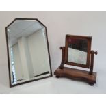 A small mahogany dressing mirror and a framed mirror with stand, with bevelled edge (2)