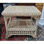 A wicker conservatory square two-tiered coffee table