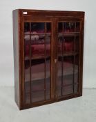 Late 19th century mahogany wall hanging display cabinet with astragal-glazed doors enclosing