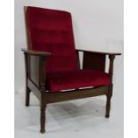 Early 20th century oak framed reclining chair with red upholstered seat and back