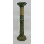 Possibly Victorian green marble plant stand with octagonal top, turned column, stepped base, 101.