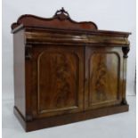 19th century mahogany sideboard with shaped and moulded back above the rectangular top, two