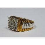 Gent's 9ct gold and diamond dress ring, rectangular set with six rows of small diamonds, step