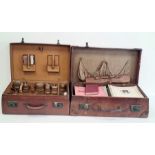 Leather suitcase with various music sheets and a leather suitcase with dressing travelling set to