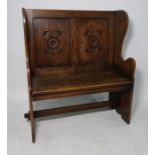 20th century oak bench with two lozenge carved panels to the back, shaped ends supports, rectangular