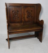 20th century oak bench with two lozenge carved panels to the back, shaped ends supports, rectangular