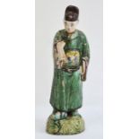 18th century Chinese pottery San Cai glazed figure of a male courtly figure, standing wearing a long