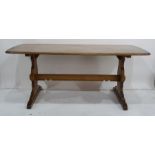 Ercol elm table on trestle style base and six chairs (7)