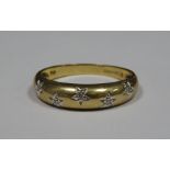 9ct gold and diamond dress ring set five small diamonds in star setting, 1.9g approx Condition