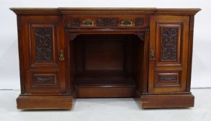 Victorian breakfront sideboard the work top above carved drawer and cupboard doors, plinth base,