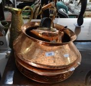 Copper kettle, a brass pitcher, two copper bowls and an embossed copper platter (5)