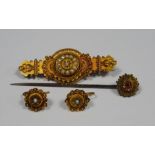 Victorian 15ct gold brooch set with seedpearls, 5.6g, a pair of similar earrings and a Victorian