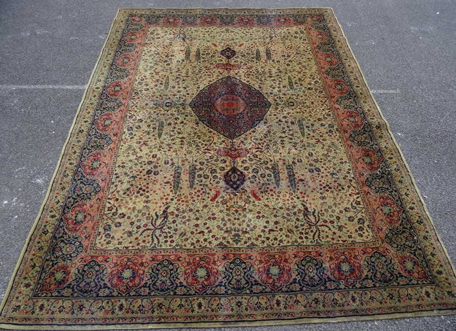 Yellow ground Eastern rug, the central medallion on a foliate decorated field, stepped border, 368cm