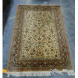 Modern cream ground rug with allover foliate decoration, 197cm x 141cm and another similar,