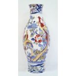 Large ironstone china vase, white and blue ground with highlighted peacocks and flowers, no.9505