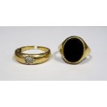 Gent's gold-coloured metal and onyx dress ring and a gent's gold-coloured ring set small diamond