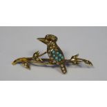 Gold metal Australian kookaburra bar brooch set with seed pearls and turquoise stones, mark to